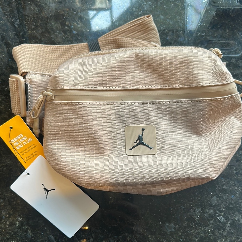 Nike Tan Crossbody Bag with Minimalist Design and Metal Accents